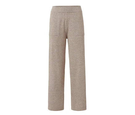 Pantalon d'intérieur en maille beige avec poches.