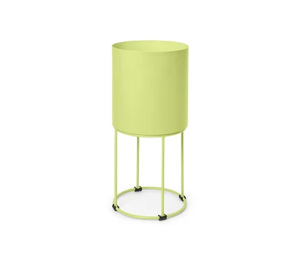Cache-pot rond vert sur un support.