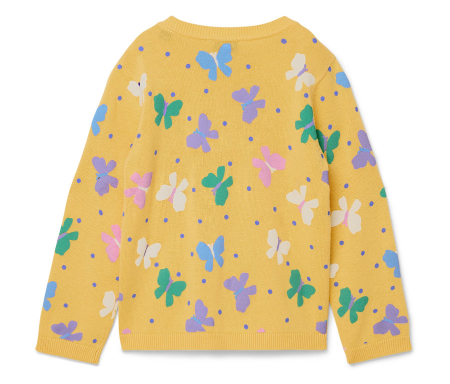 Pull jaune avec des papillons colorés et des points bleus.