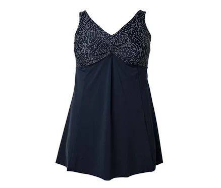 Maillot de bain bleu marine avec motif de feuilles blanches.