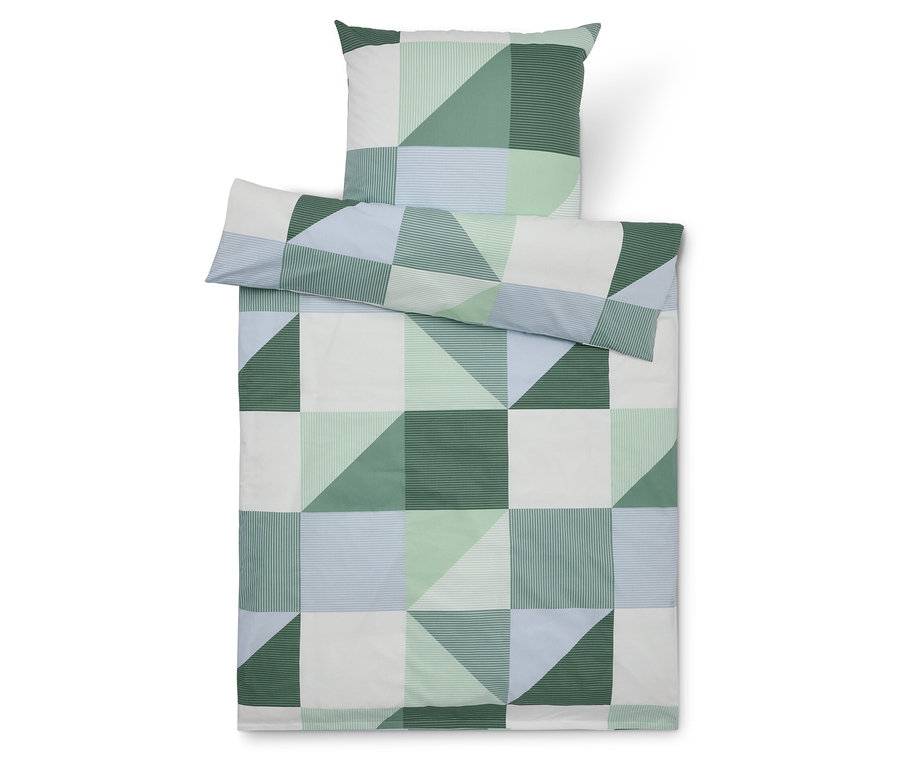 Ensemble de literie avec motif géométrique en vert, bleu et blanc.