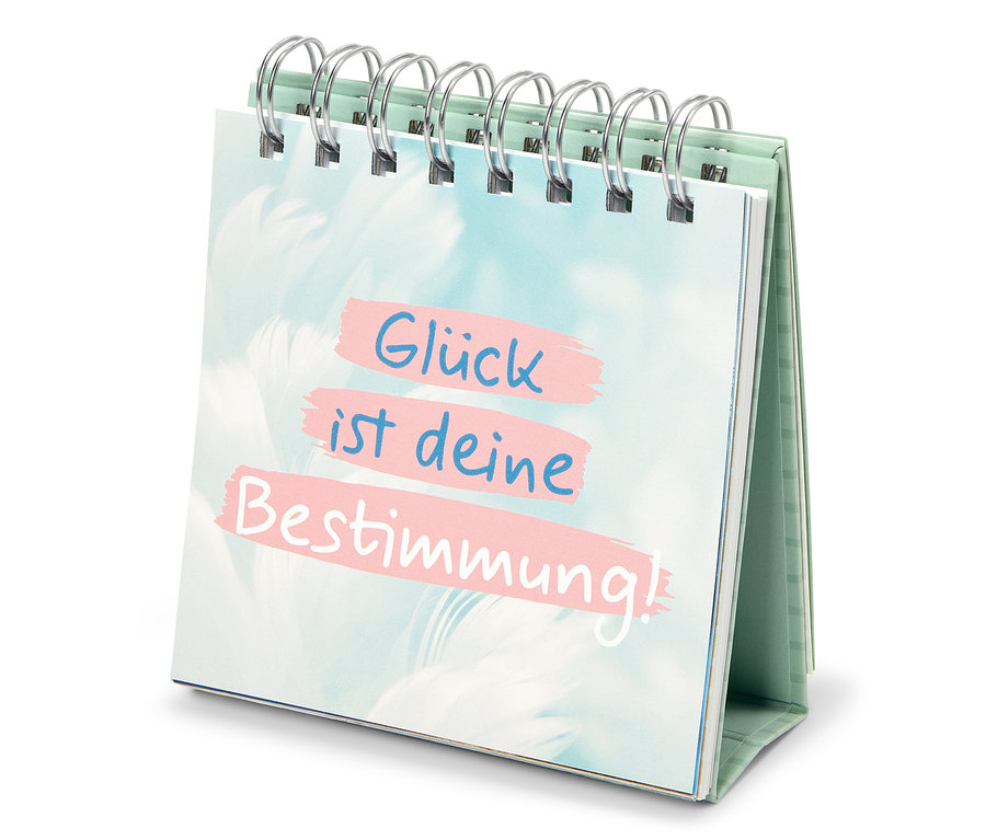 Un calendrier de table affichant le message "Le bonheur est votre destin !"