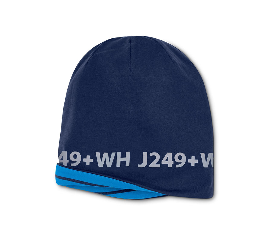Un bonnet réversible bleu marine avec inscription.