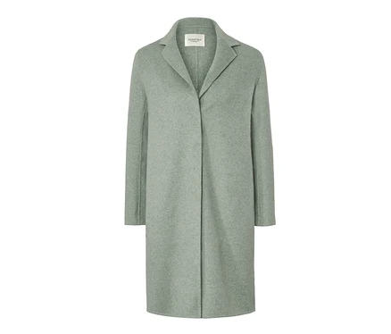 Manteau court vert clair avec de la laine.