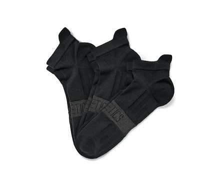 Trois paires de chaussettes de course professionnelles noires.