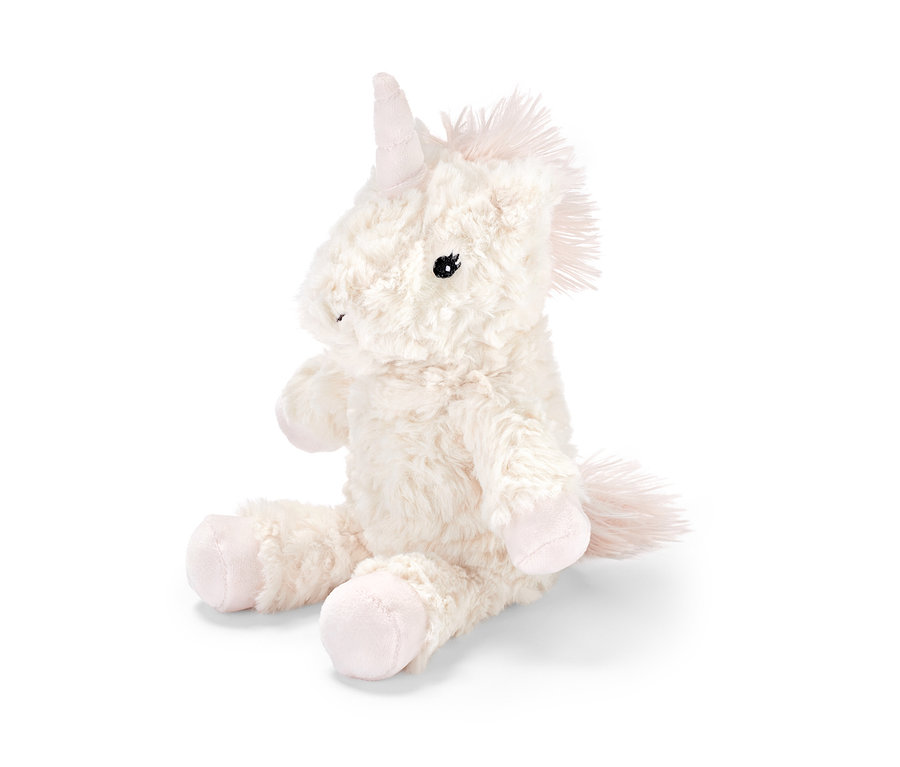 Peluche « Licorne » assise avec une crinière rose.