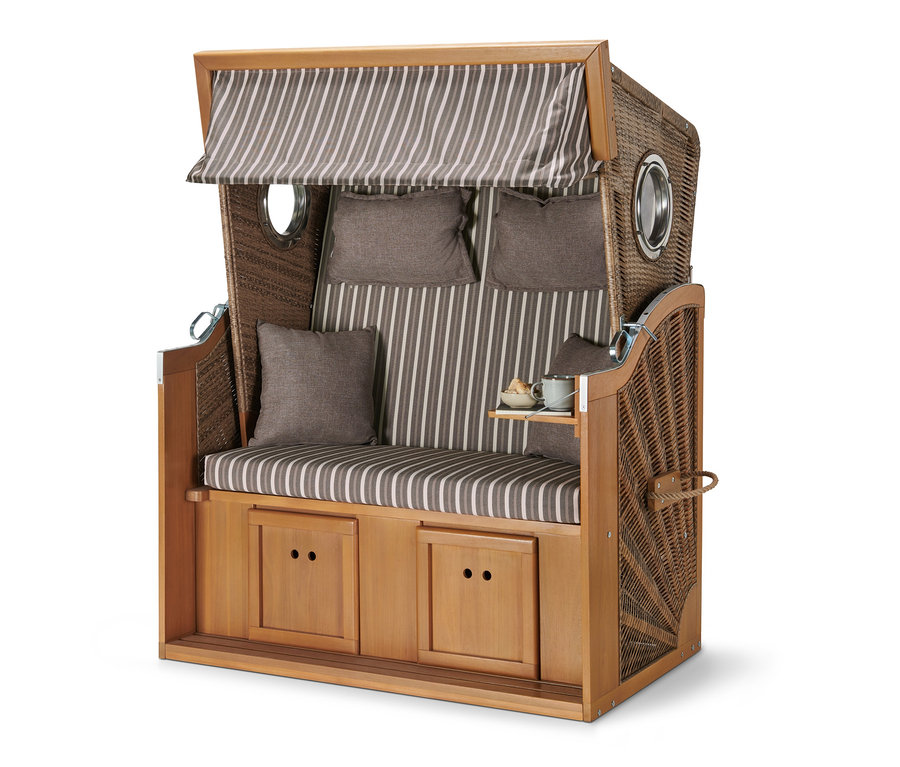 Vue de face d'une corbeille de plage premium XL avec table rabattable, avec coussins rayés et coussins marron.