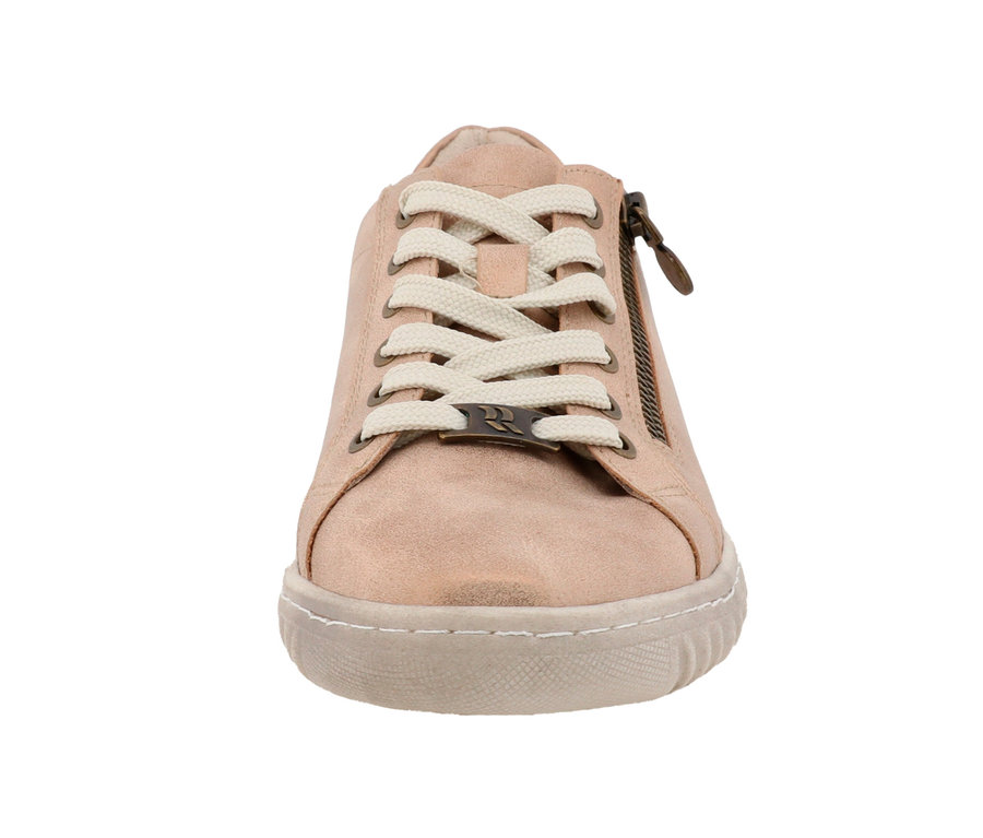 Gros plan sur une basket Romika, PU bronze avec des lacets blancs.