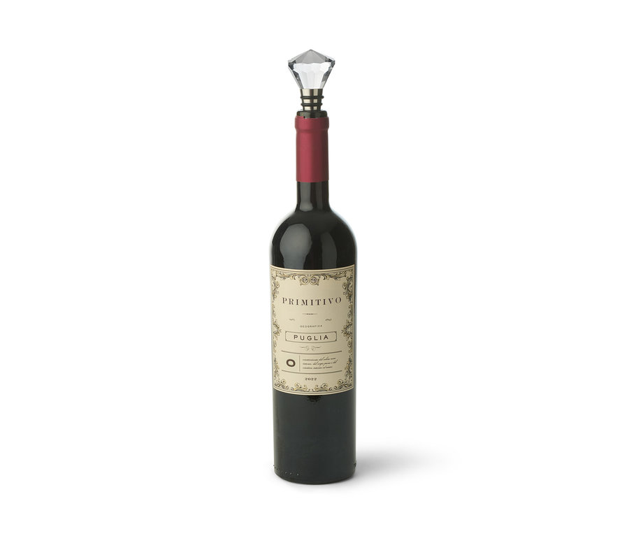Une bouteille de vin rouge avec un bouchon de bouteille.