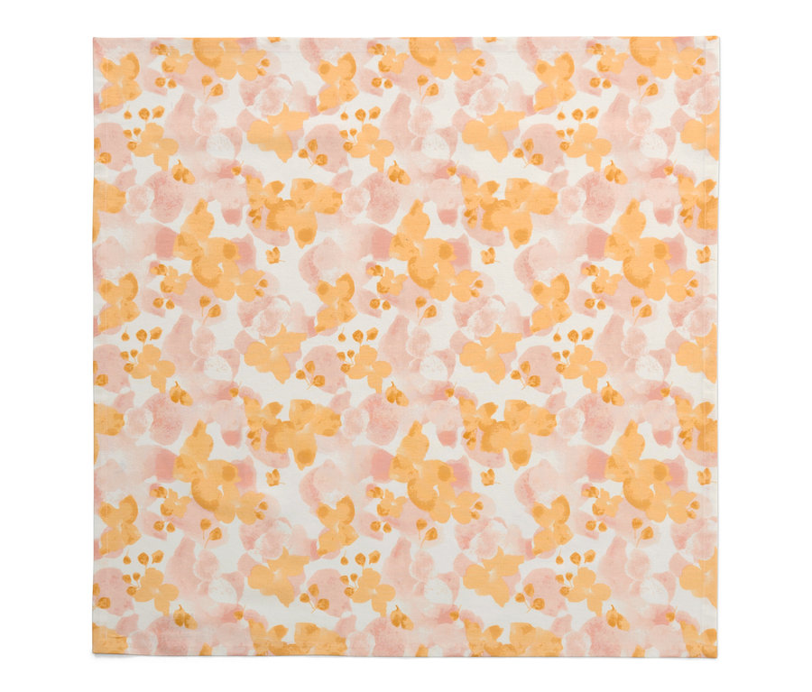 Une nappe d’extérieur moyenne, env. 90 x 90 cm, à motifs floraux est posée à plat.