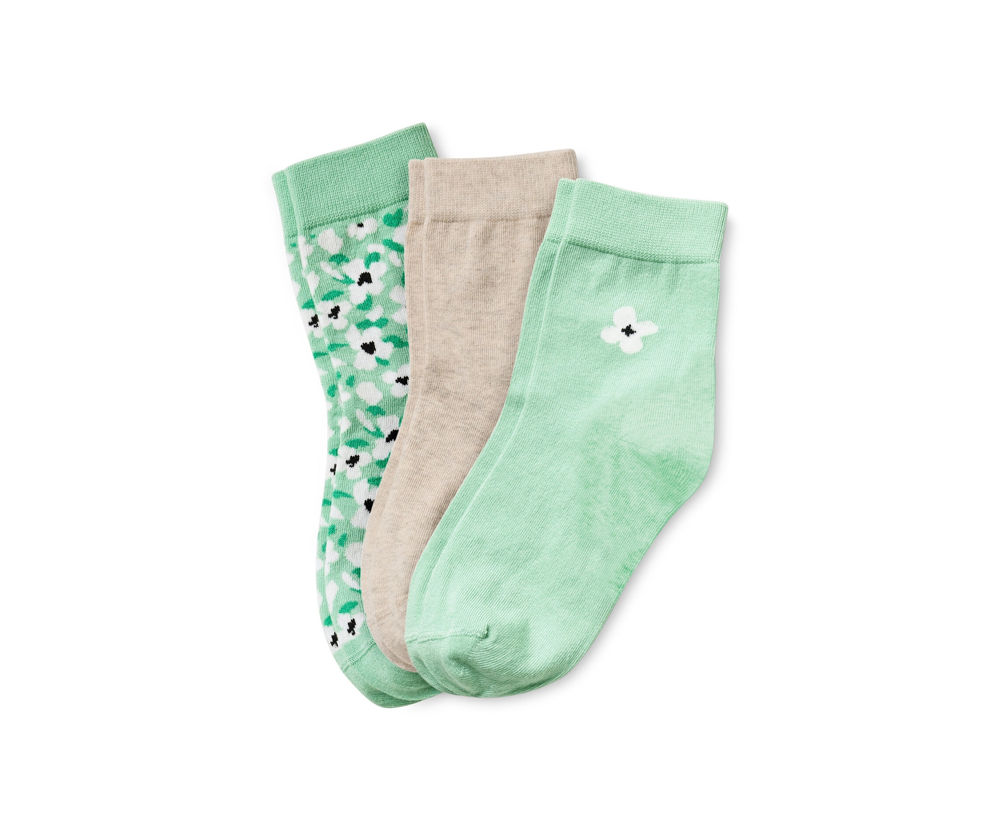 Trois paires de chaussettes : une paire vert clair avec des fleurs blanches, une paire beige et une paire vert clair avec une fleur blanche.