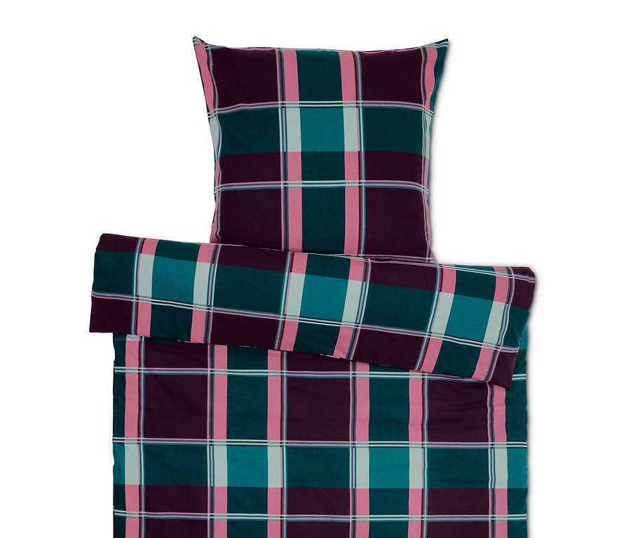 Ensemble de literie à carreaux dans les tons de violet, vert et rose.
