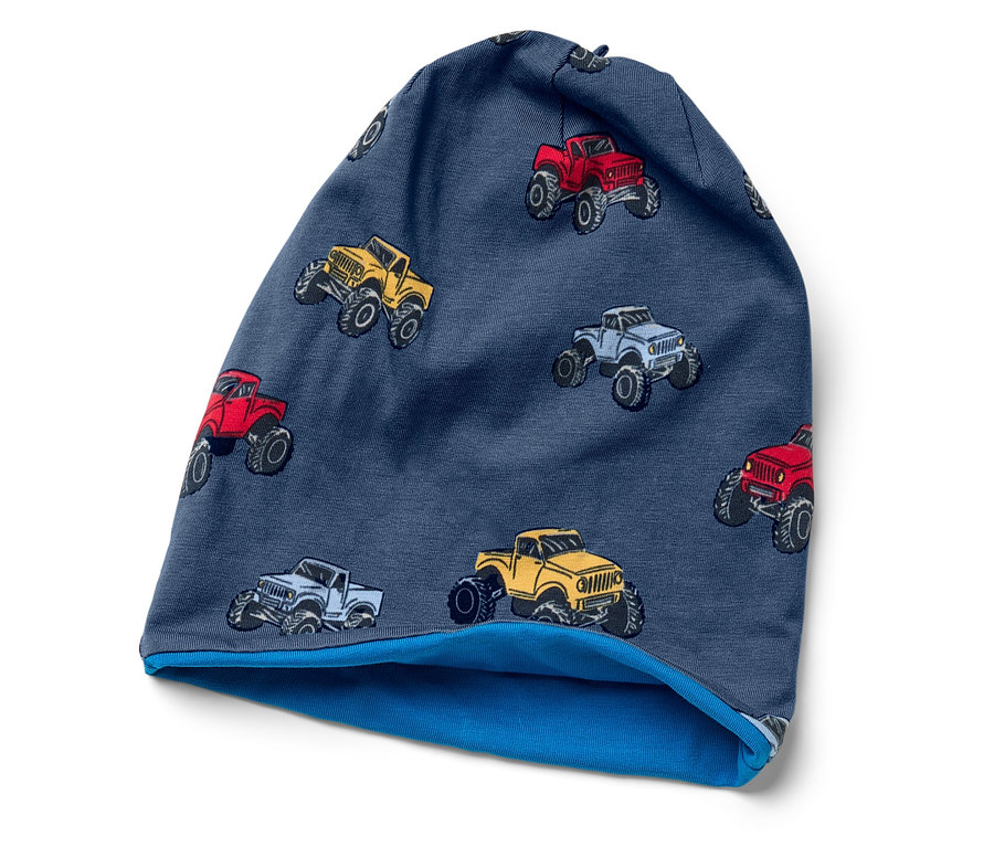 Bonnet bleu avec des camions monstres rouges, jaunes et gris.