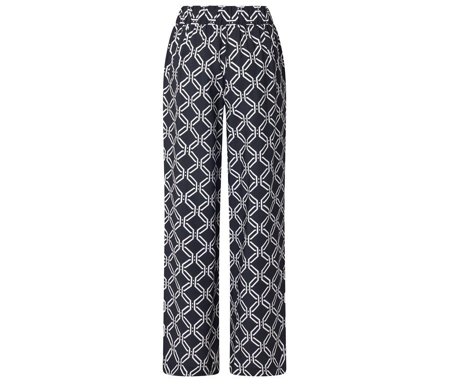 Pantalon avec motif géométrique bleu et blanc.
