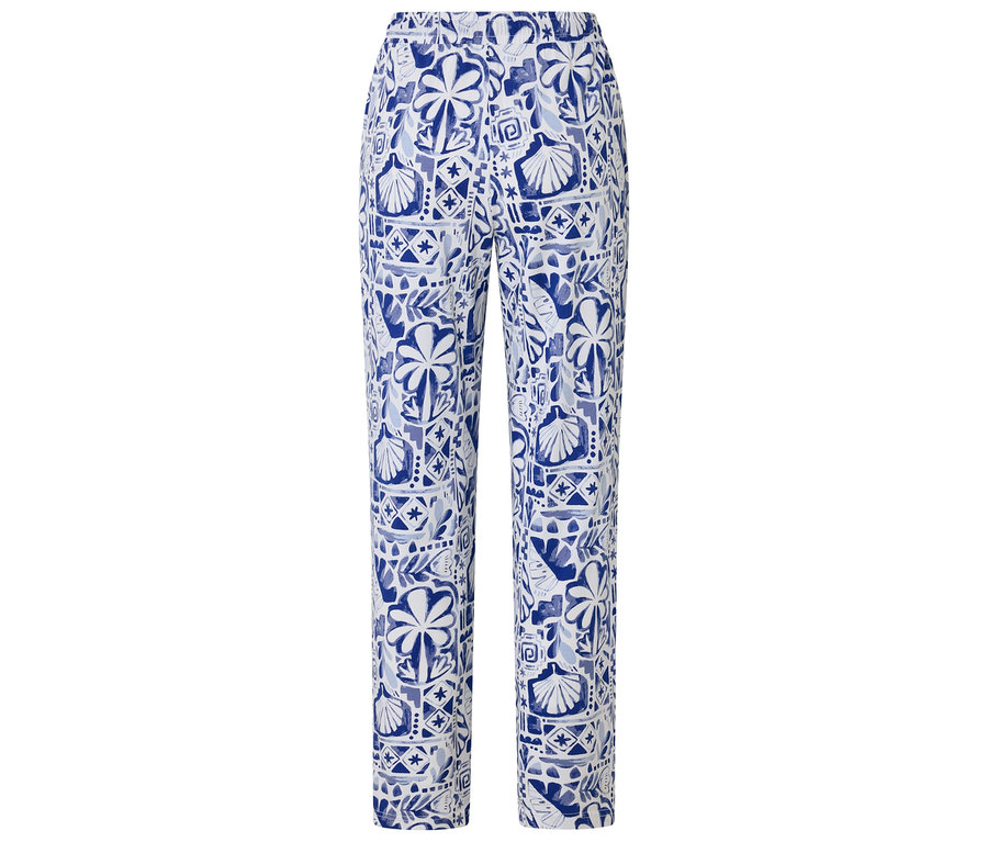 Pantalon bleu et blanc à motifs palmiers et coquillages.
