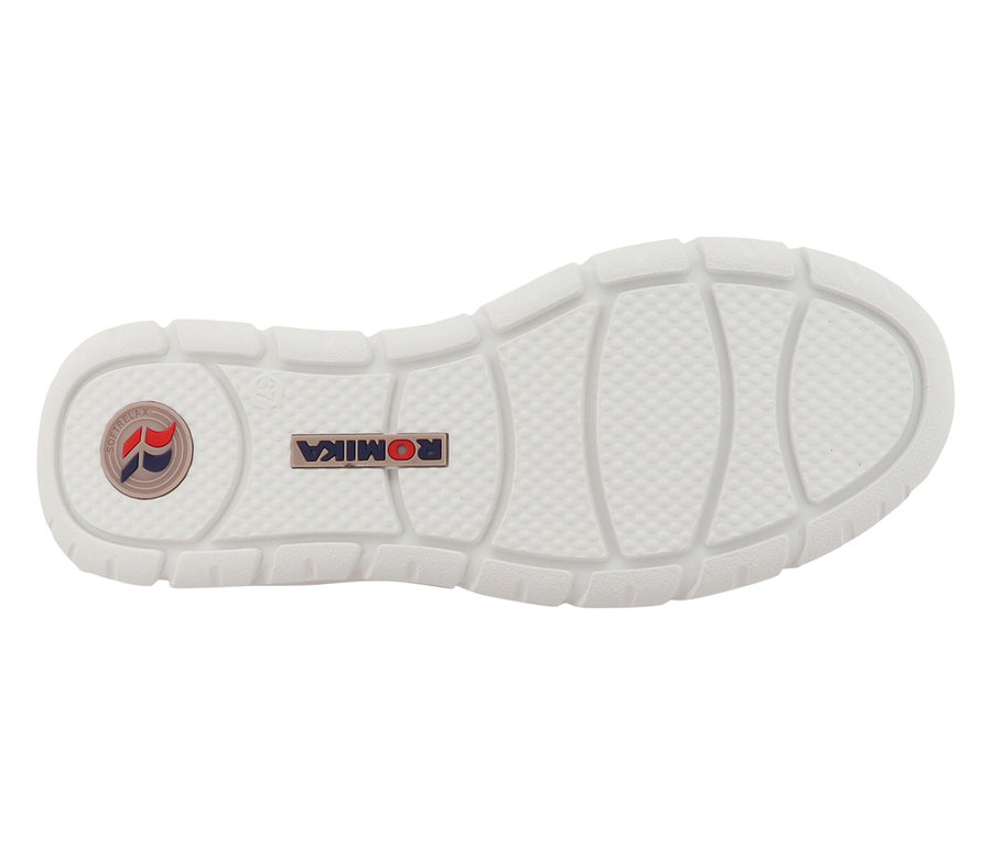 Semelle d'une chaussure Romika blanche avec le logo Romika.
