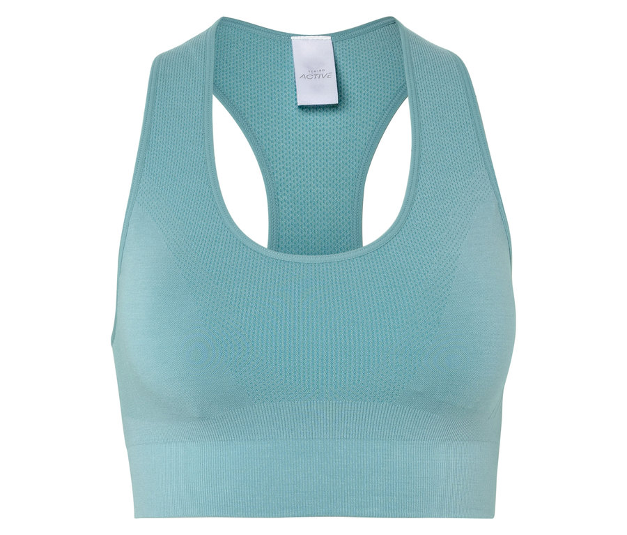 Gros plan d'une brassière de sport turquoise avec dos nageur.