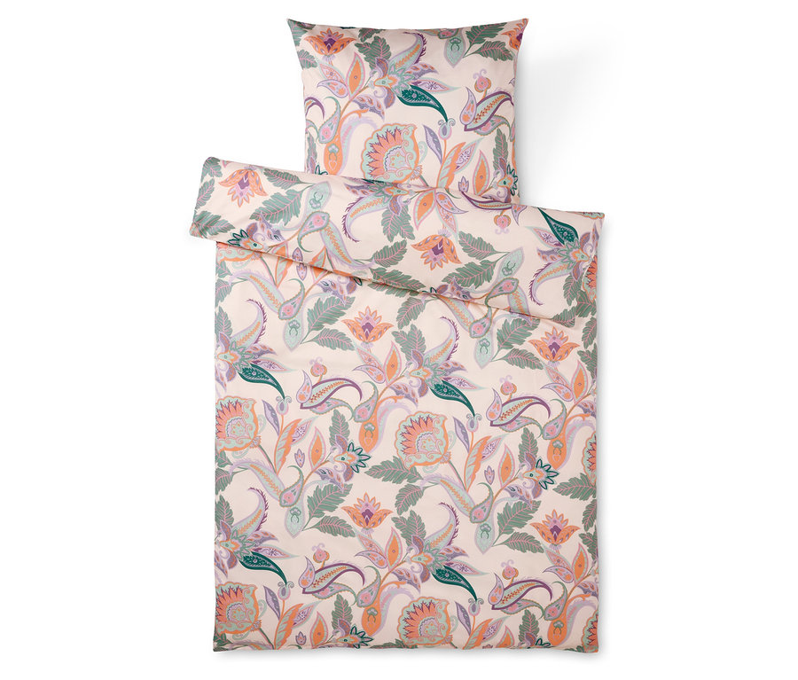 Ensemble de literie à motif floral dans les tons orange, vert et violet, comprenant une taie d'oreiller et une housse de couette.