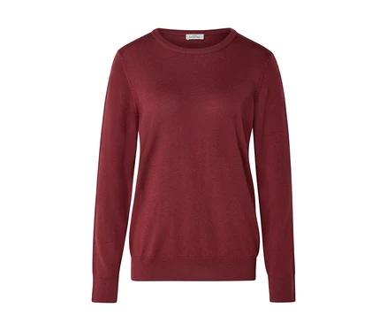 Un pull à manches longues et col rond de couleur bordeaux, posé à plat sur un fond blanc. Il a des poignets et un ourlet côtelés, et une petite étiquette blanche 'MYSTYLE' est visible à l'intérieur du col.