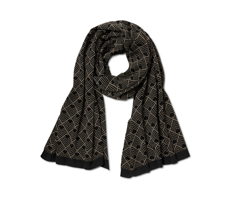 Une écharpe noire en maille avec du fil scintillant et un motif géométrique.