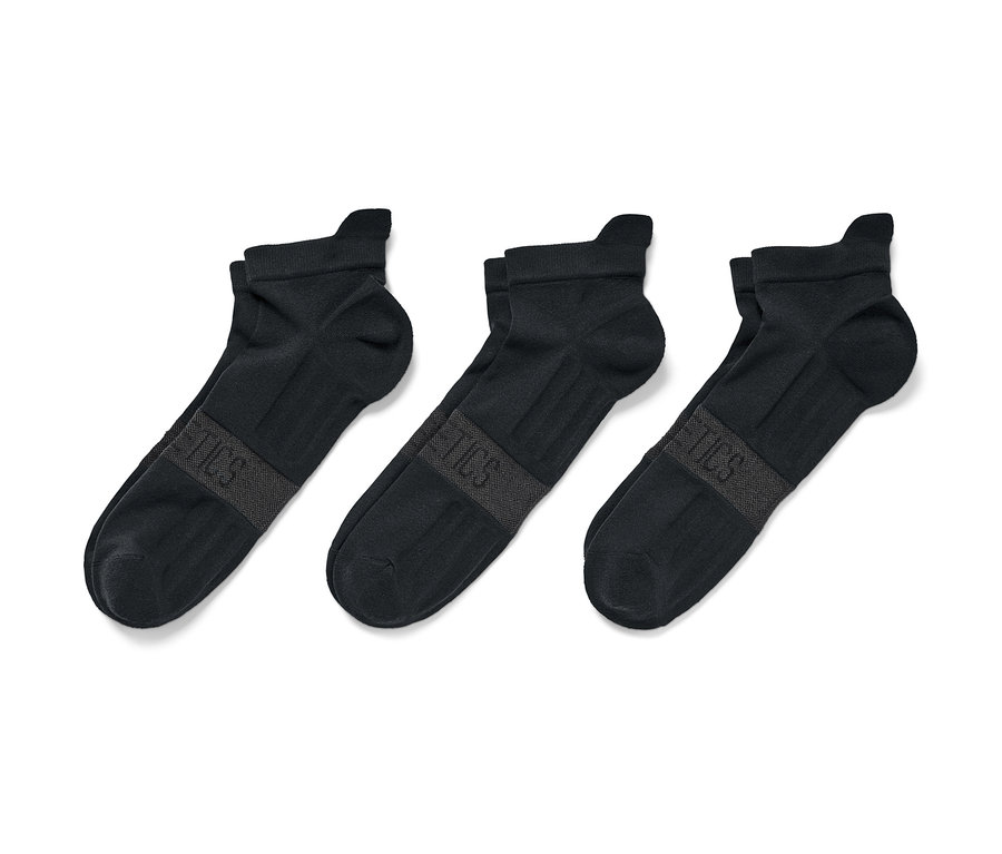 Trois paires de chaussettes de course professionnelles sont côte à côte.