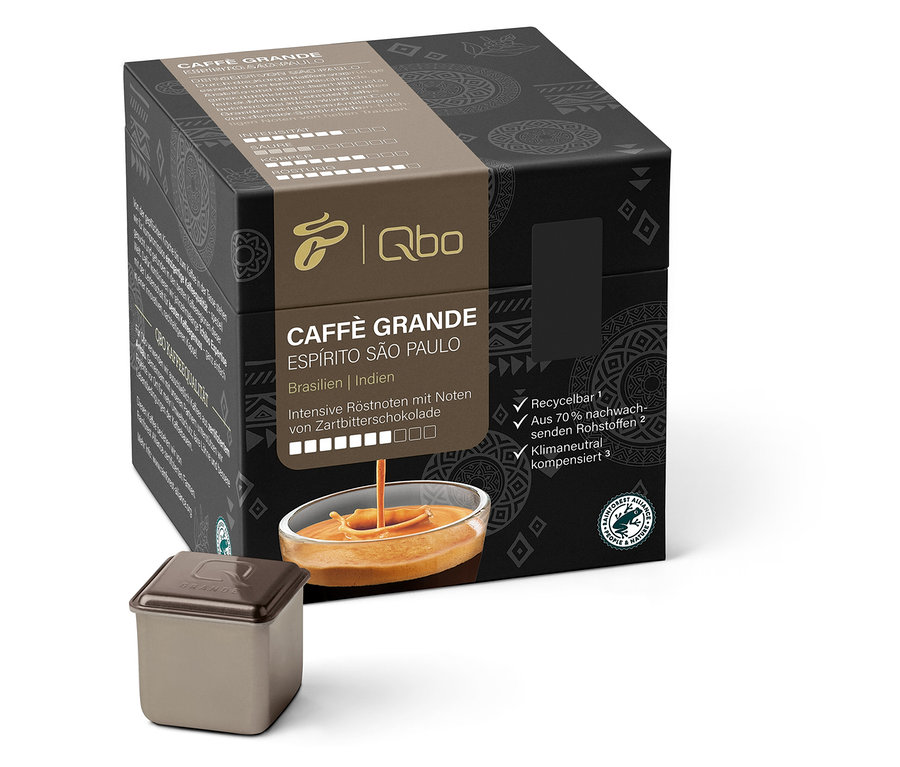 Un paquet de Qbo Caffè Grande ESPÍRITO SÃO PAULO et Qbo Caffè Grande BELO SUL ainsi qu'une capsule.