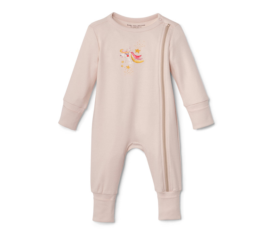 Pyjama beige avec une licorne.