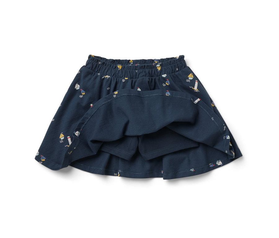 Jupe en jersey marine pour enfants avec pantalon intégré.