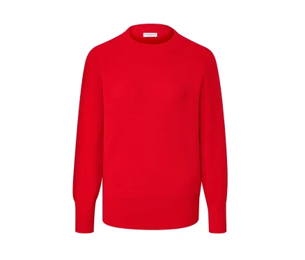 Pull en maille fine rouge.