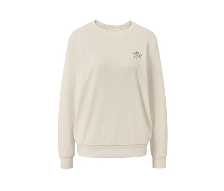 Un sweat-shirt crème avec broderie.