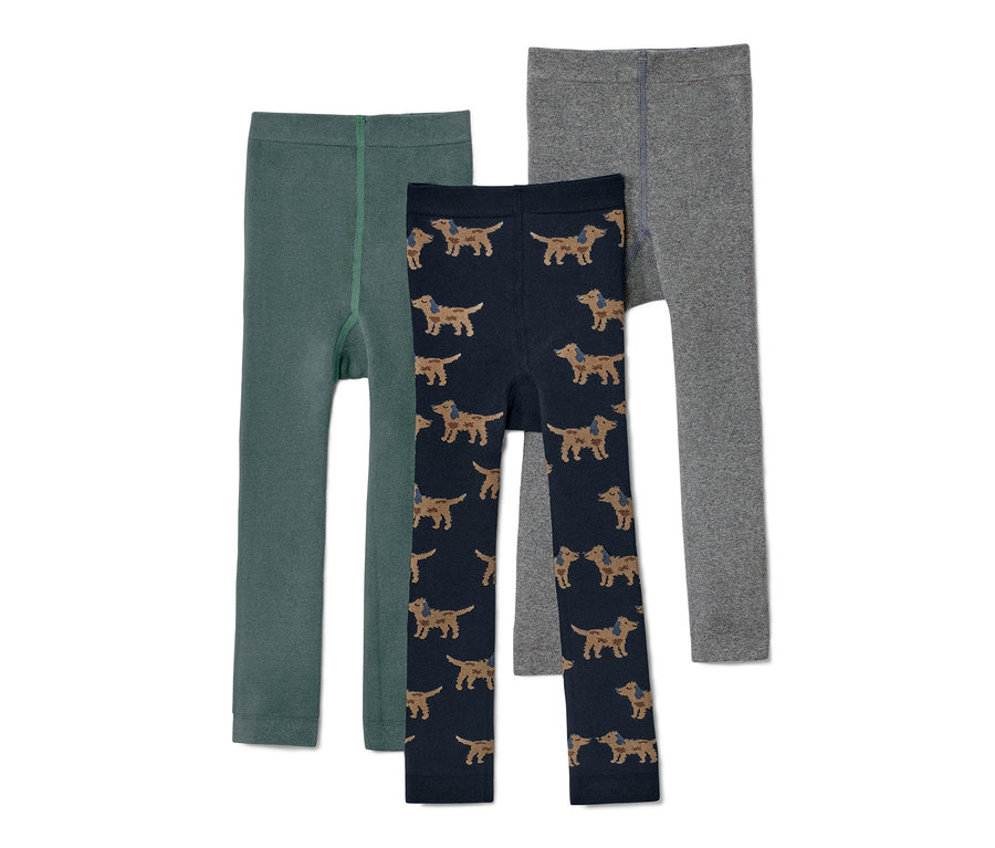 Trois leggings thermiques pour enfant : un vert, un bleu marine à motif de teckels et un gris.
