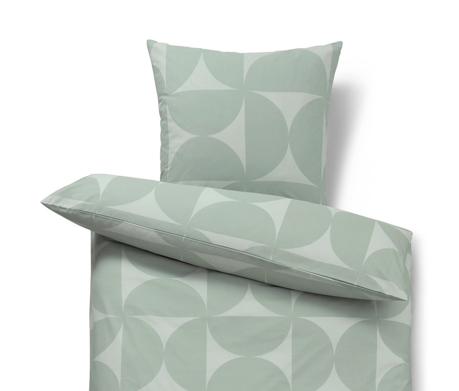 Parure de lit en renforcé verte avec motif géométrique.