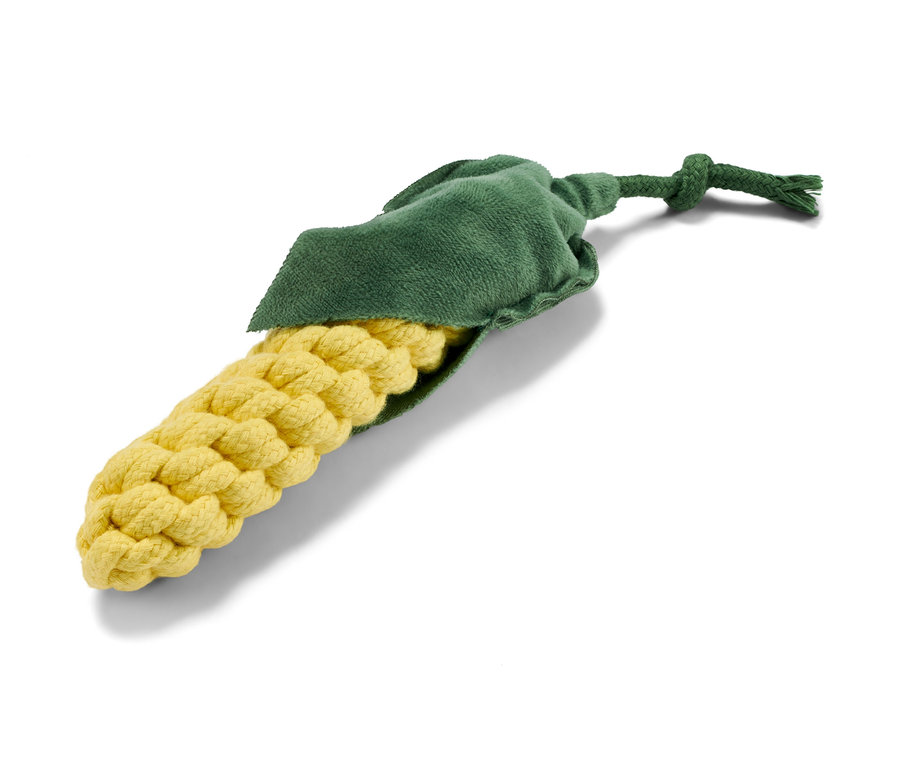 Un jouet pour chien « Maïs » est posé sur un fond blanc.