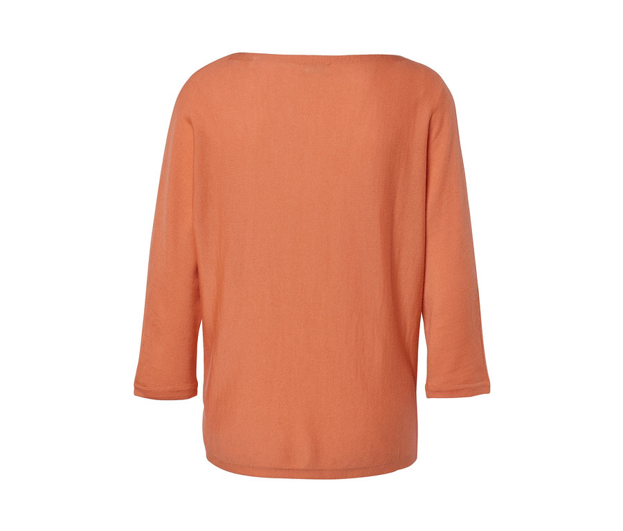 Pull en maille fine de laine mérinos pêche.