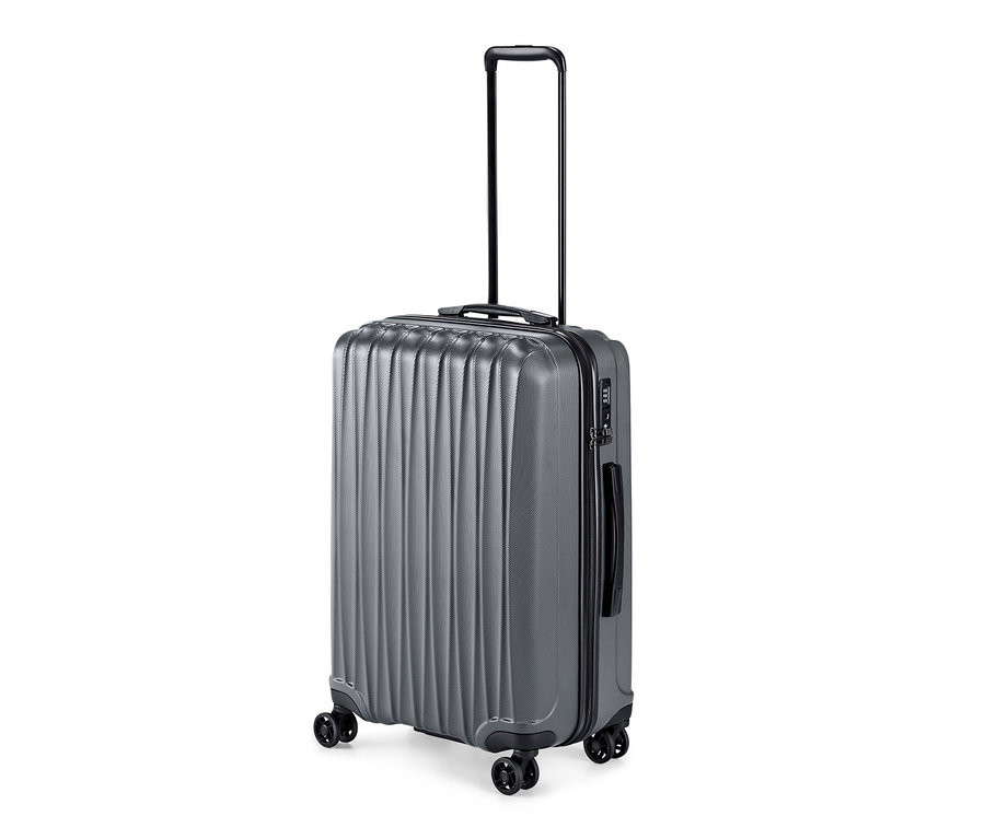 Valise rigide grise du lot de valises moyenne et grande.