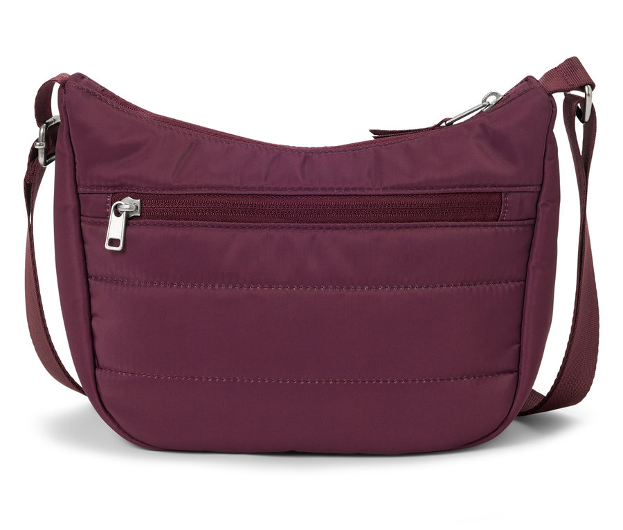 Un sac à main bordeaux avec une bandoulière réglable.