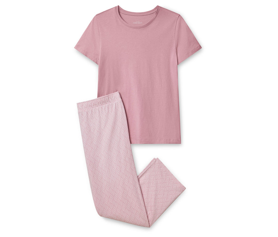 Ensemble de pyjama rose composé d'un t-shirt et d'un pantalon à motif de feuilles.