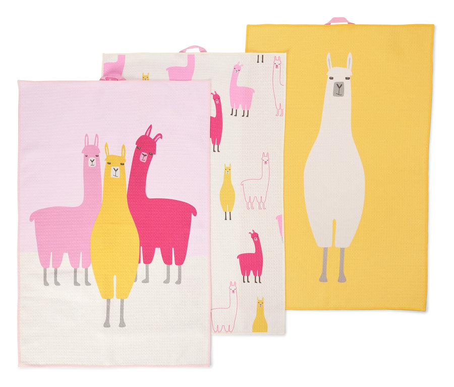 Trois torchons sont superposés. Les torchons sont roses, jaunes et blancs et sont imprimés de lamas.