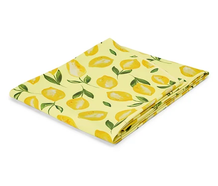 Couverture jaune pliée avec motif citron.