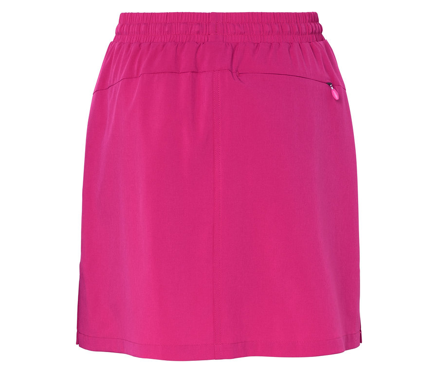 Gros plan d'une jupe rose avec une taille élastique et une poche zippée.