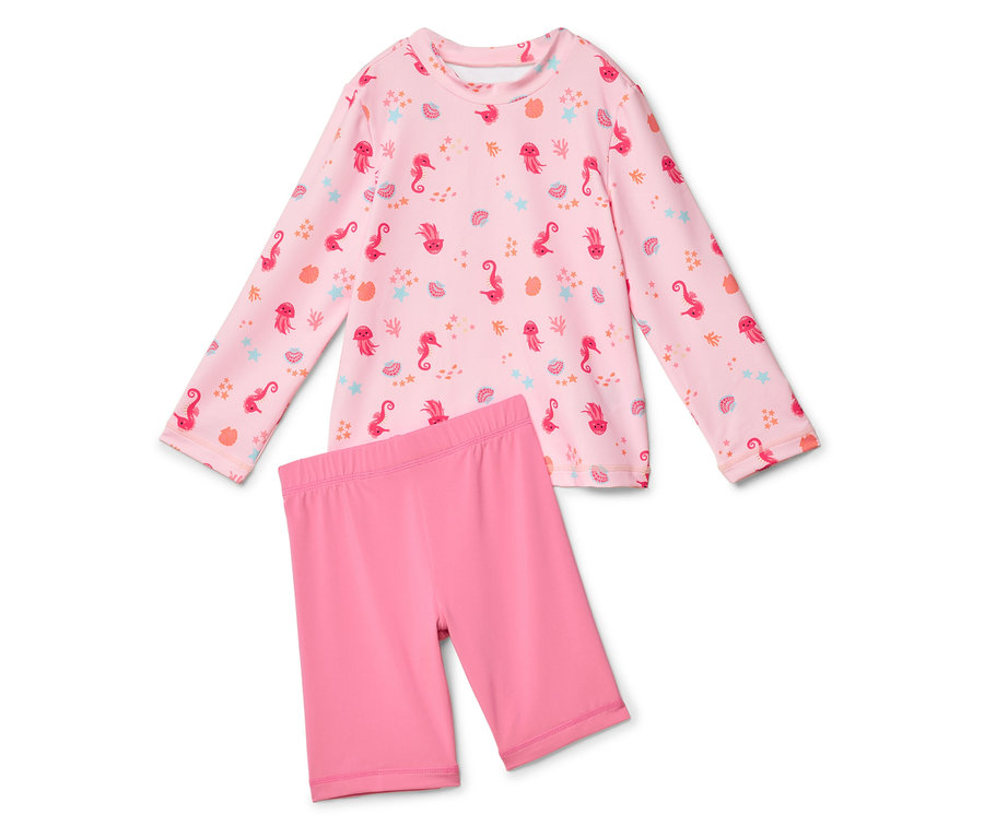 Haut rose à manches longues avec motif d'animaux marins et short rose.