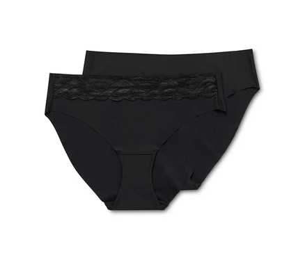 Deux culottes noires pour femmes sont posées l'une sur l'autre.