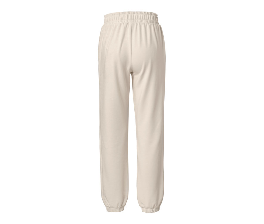 Vue arrière d'un pantalon molletonné très doux de couleur beige.