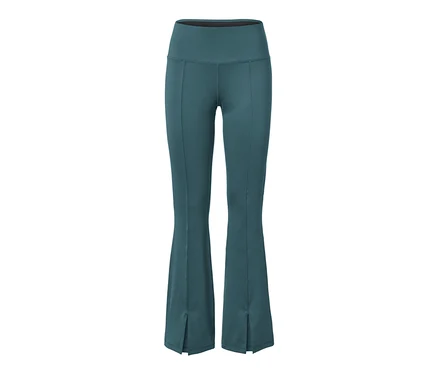 Pantalon de sport modelant vert émeraude foncé.