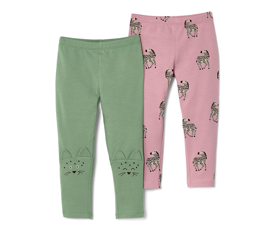 Deux leggings pour enfant : un vert avec des motifs de chat aux genoux et un rose avec un motif zébré.