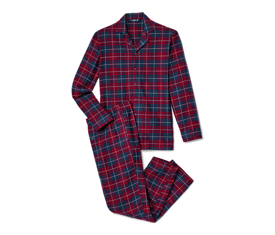 Pyjama en flanelle bleu-rouge bordeaux posé sur un fond blanc.