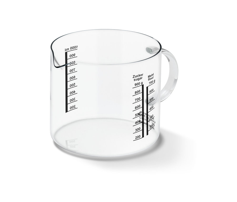 Gobelet mesureur transparent avec des repères pour mesurer le sucre et la farine.