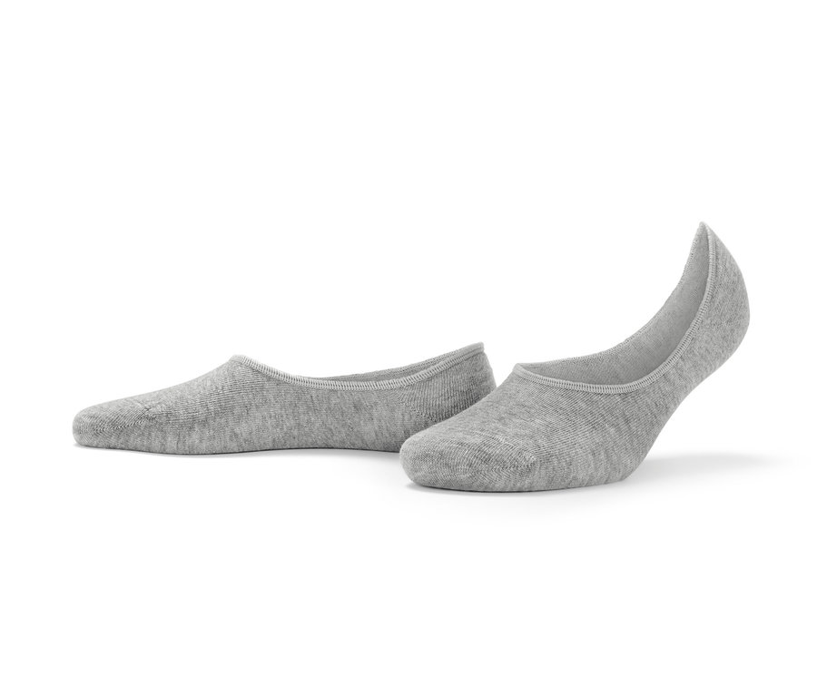 Deux paires de socquettes de sneakers grises.