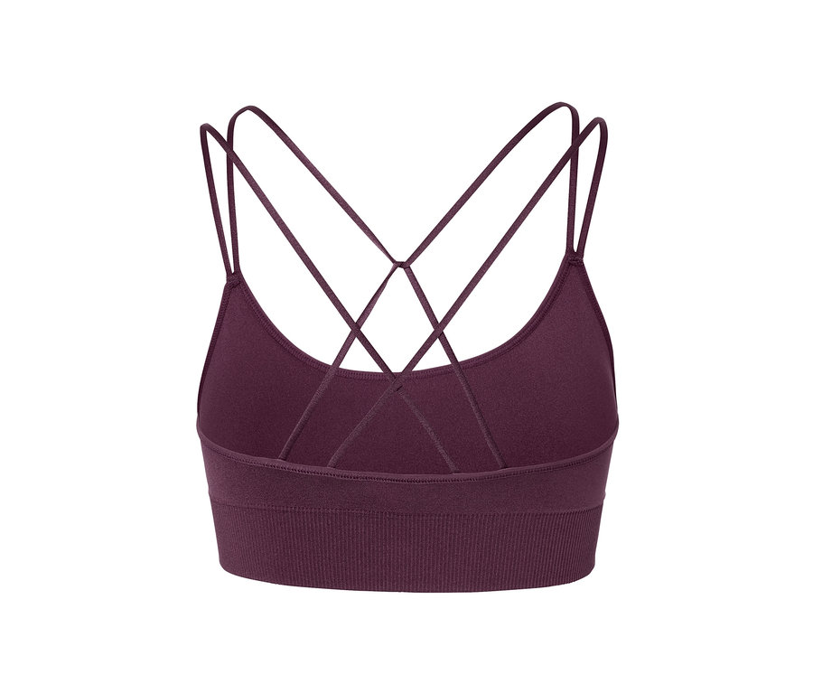Gros plan d'une brassière de sport Seamless violette avec des bretelles croisées dans le dos.