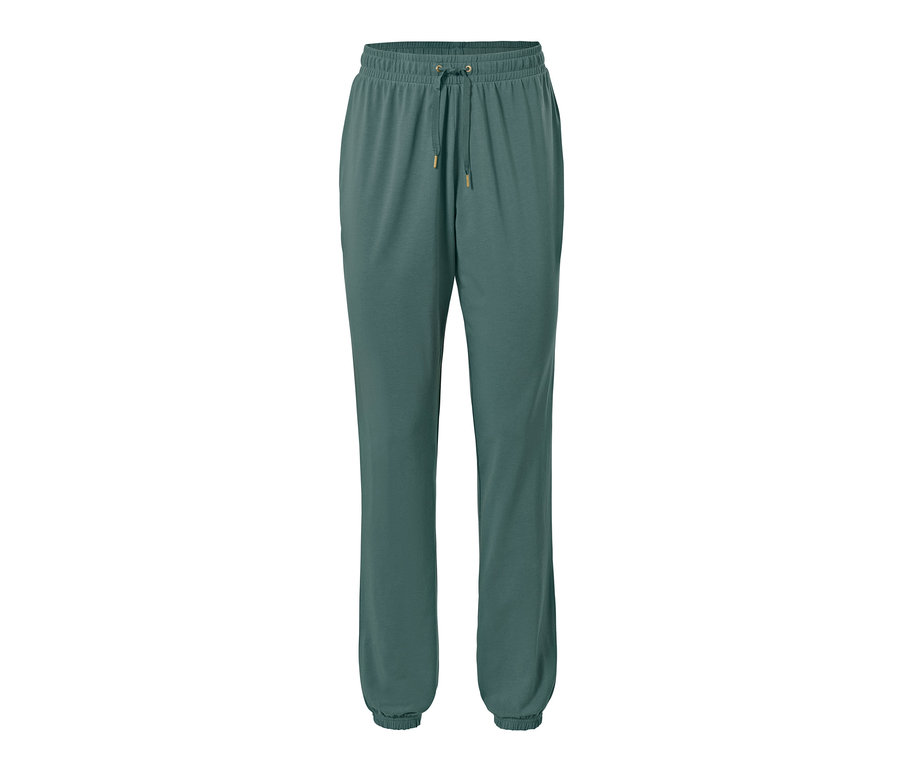 Un pantalon de pyjama vert avec cordon de serrage.
